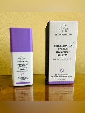NIP Drunk Elephant Eye Balm with Purple Cap and White Bottle